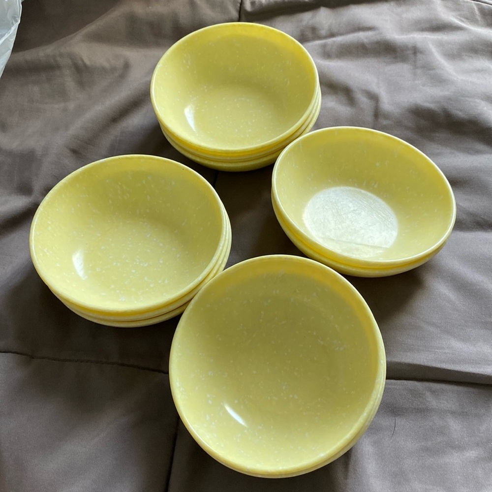 11 small plastic like bowls